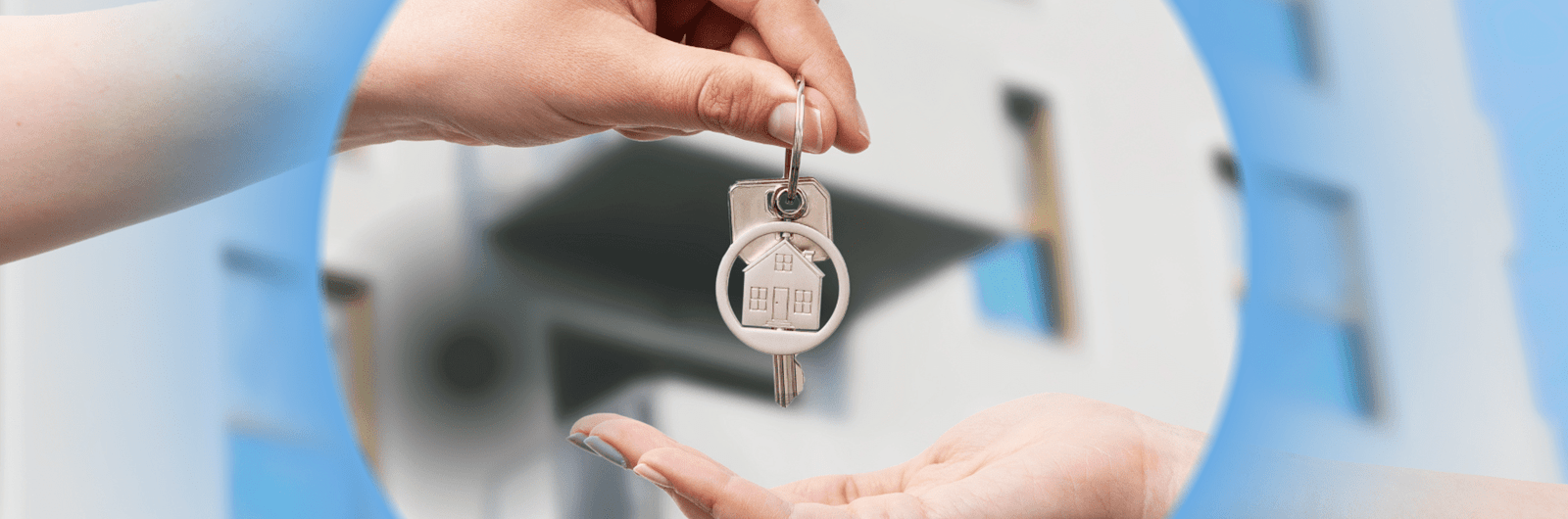 two hands receiving key