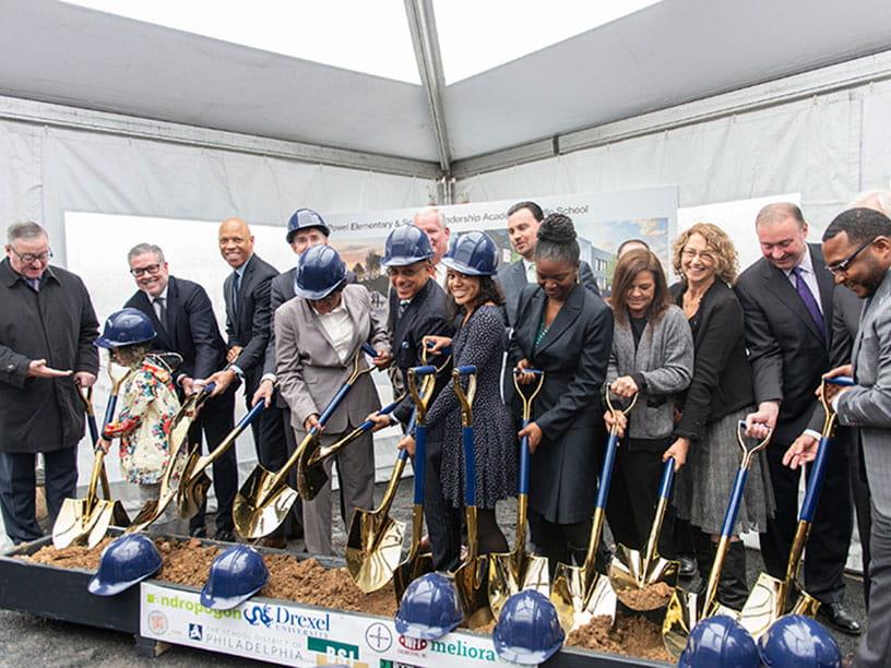 Group of people at a groundbreaking celebration