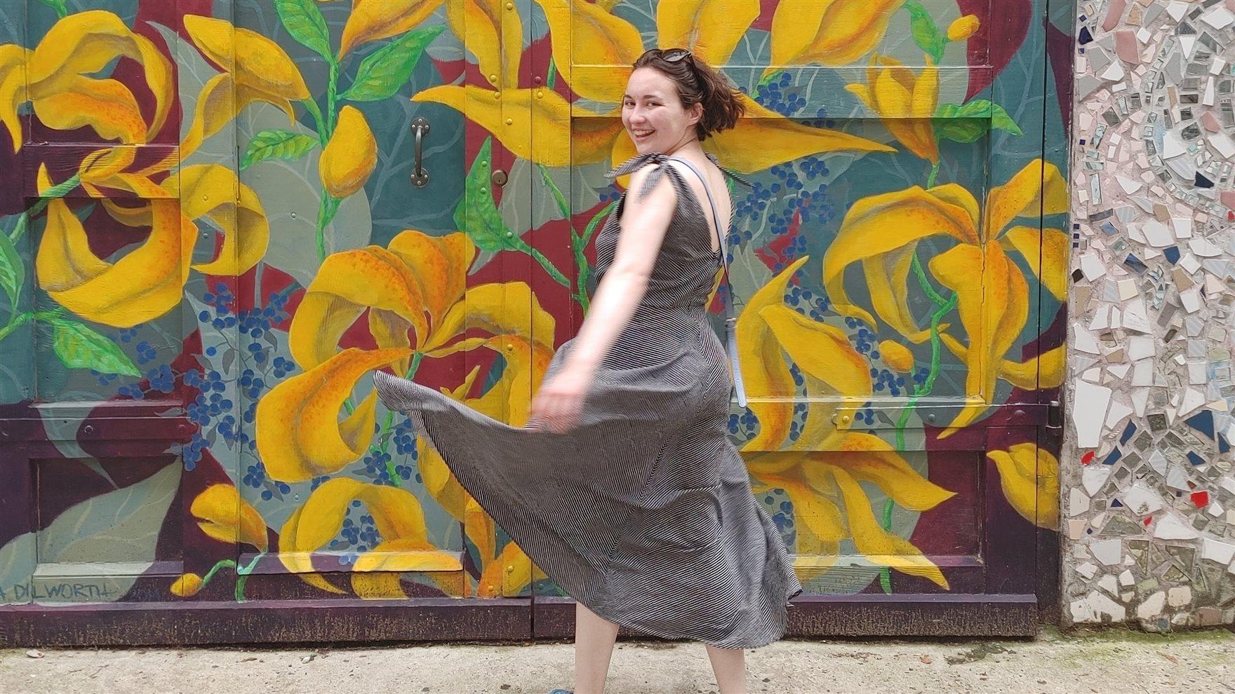 Student standing in front of doors